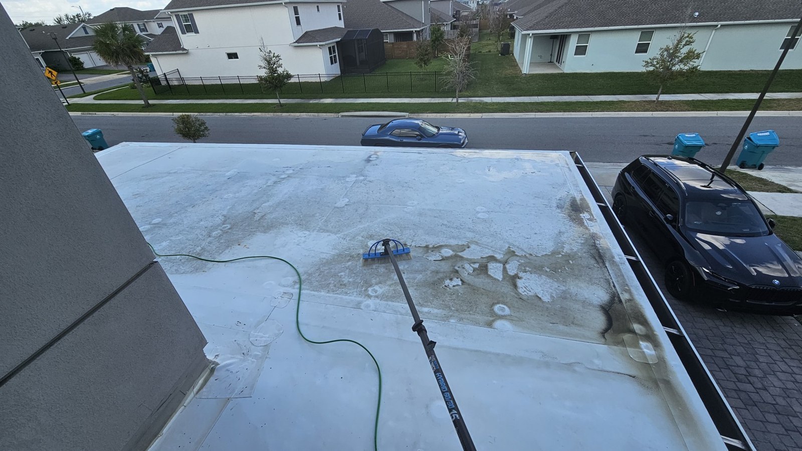 Pressure Washing in Saint Cloud, FL: surface cleaning tool washing an outdoor hard surface